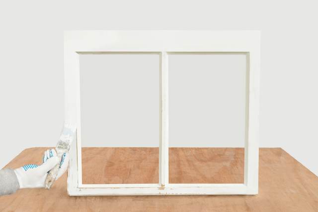 A draught proofed white timber sash window in a London property